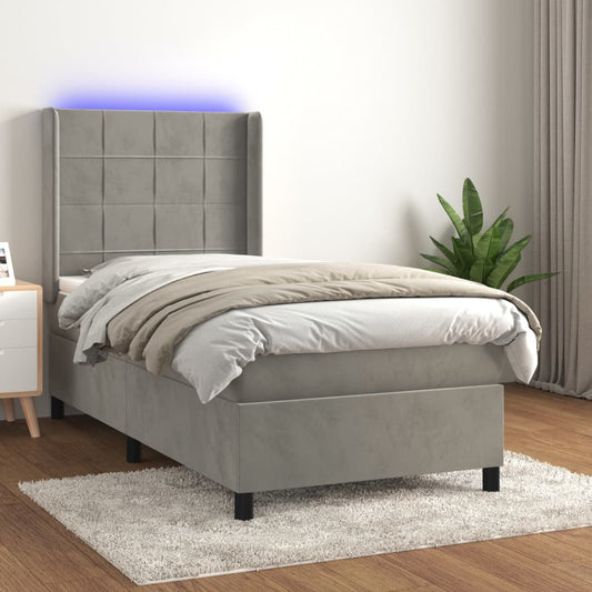 Boxspring met matras en LED fluweel lichtgrijs 90x190 cm