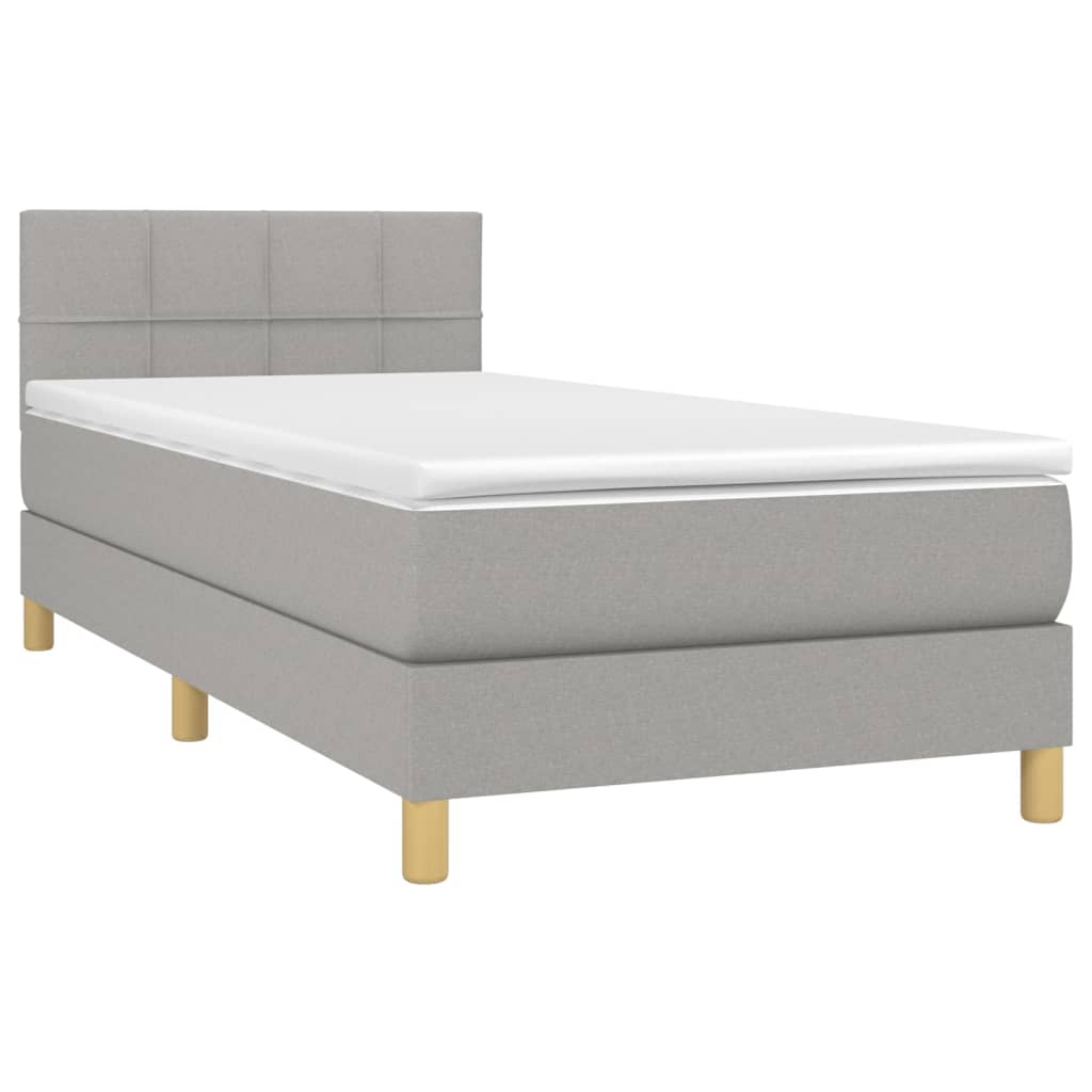 Boxspring met matras en LED stof lichtgrijs 90x200 cm