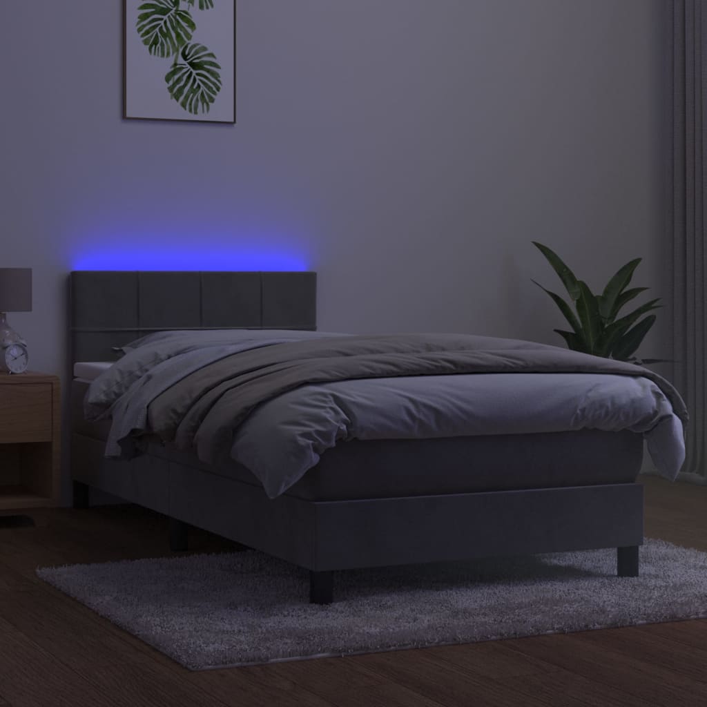 Boxspring met matras en LED fluweel lichtgrijs 90x200 cm