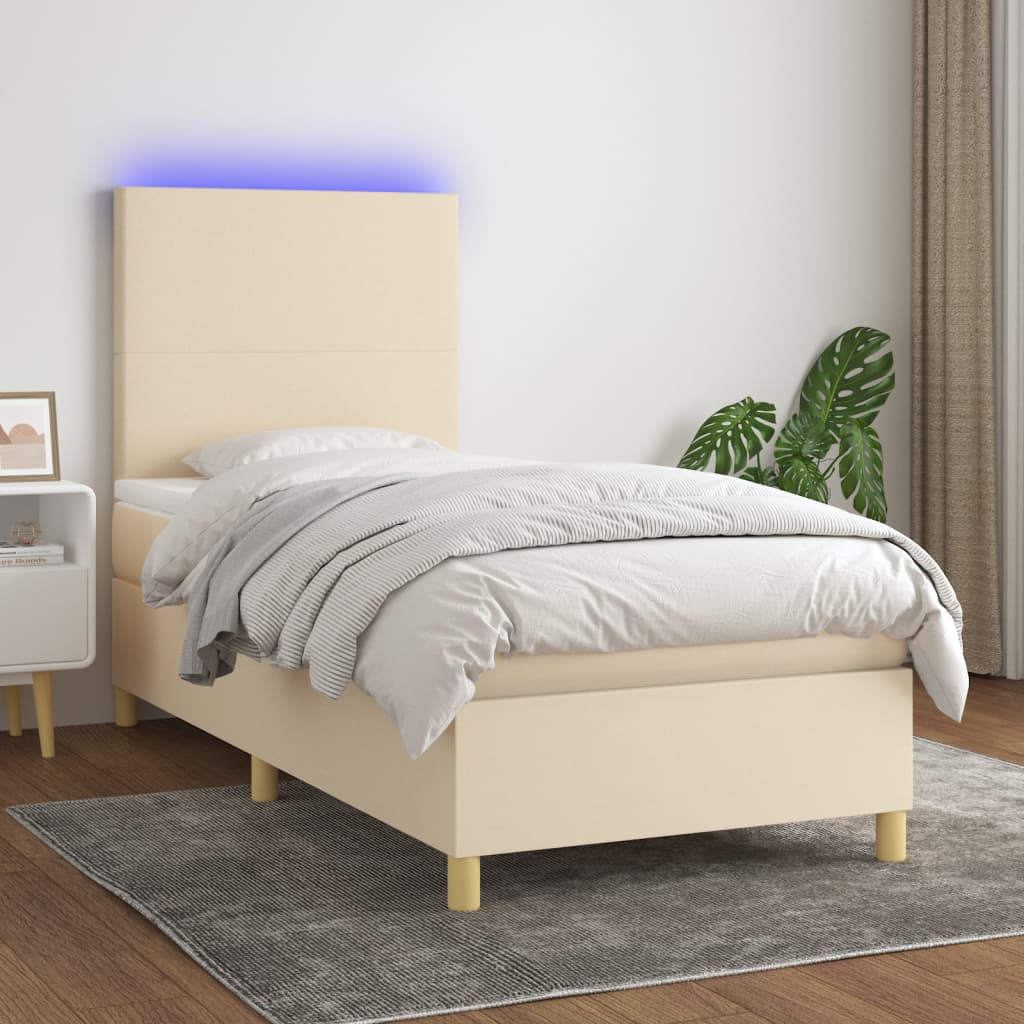 Boxspring met matras en LED stof crèmekleurig 90x190 cm