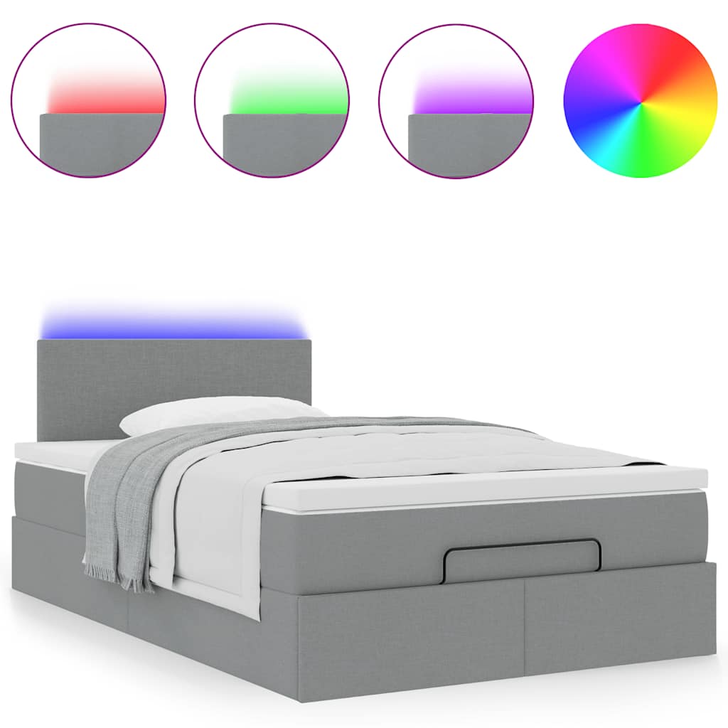 Ottoman bed met matras en LED's 120x190 cm stof lichtgrijs