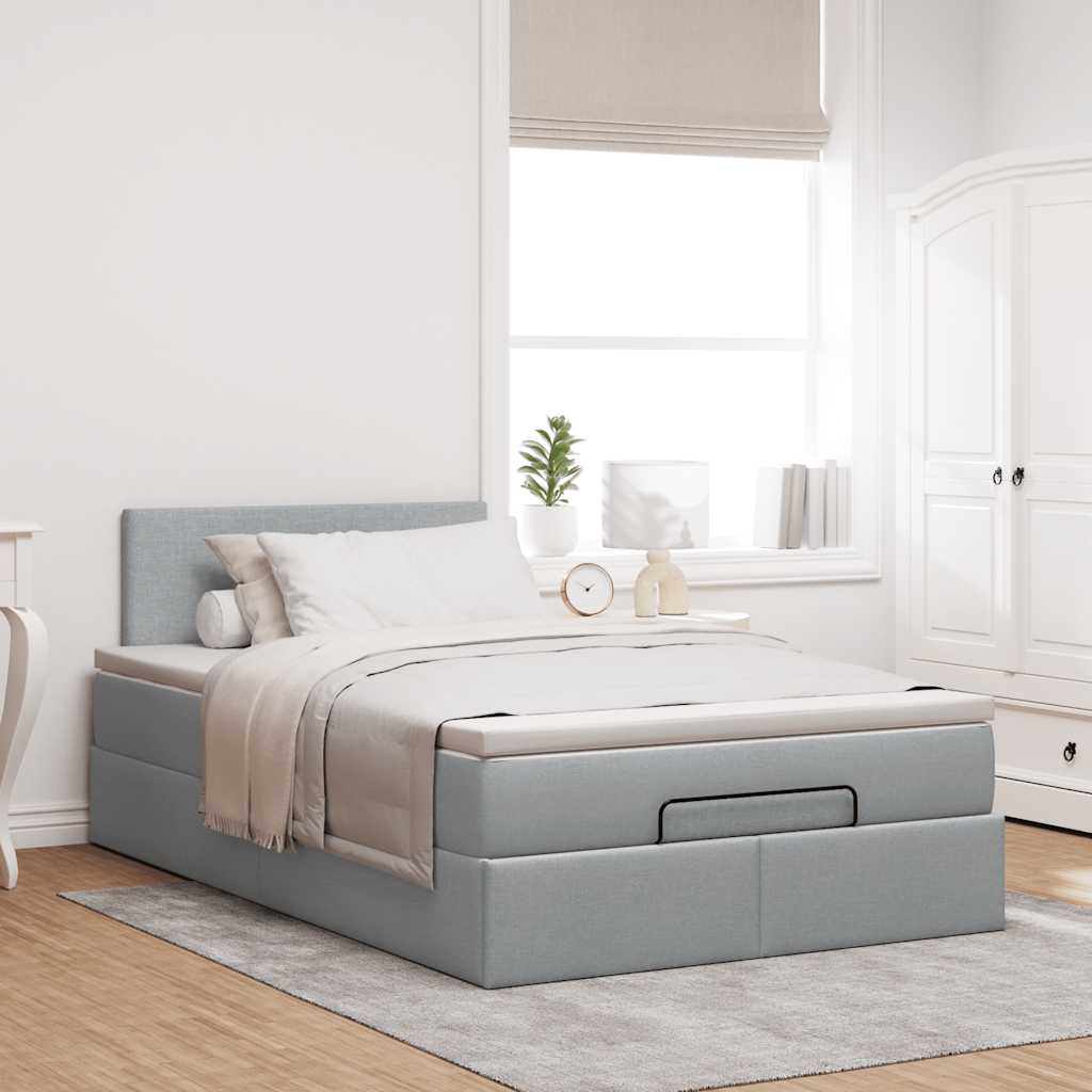 Ottoman bed met matras en LED's 120x190 cm stof lichtgrijs