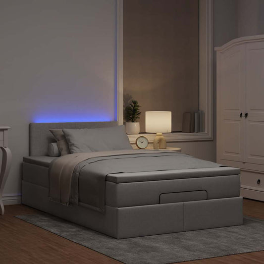 Ottoman bed met matras en LED's 120x190 cm stof taupe