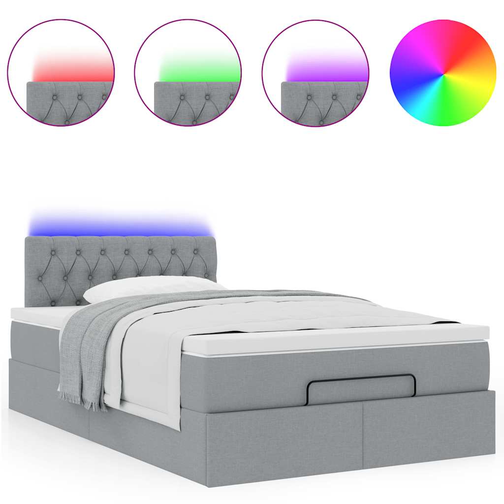 Ottoman bed met matras en LED's 120x190 cm stof lichtgrijs