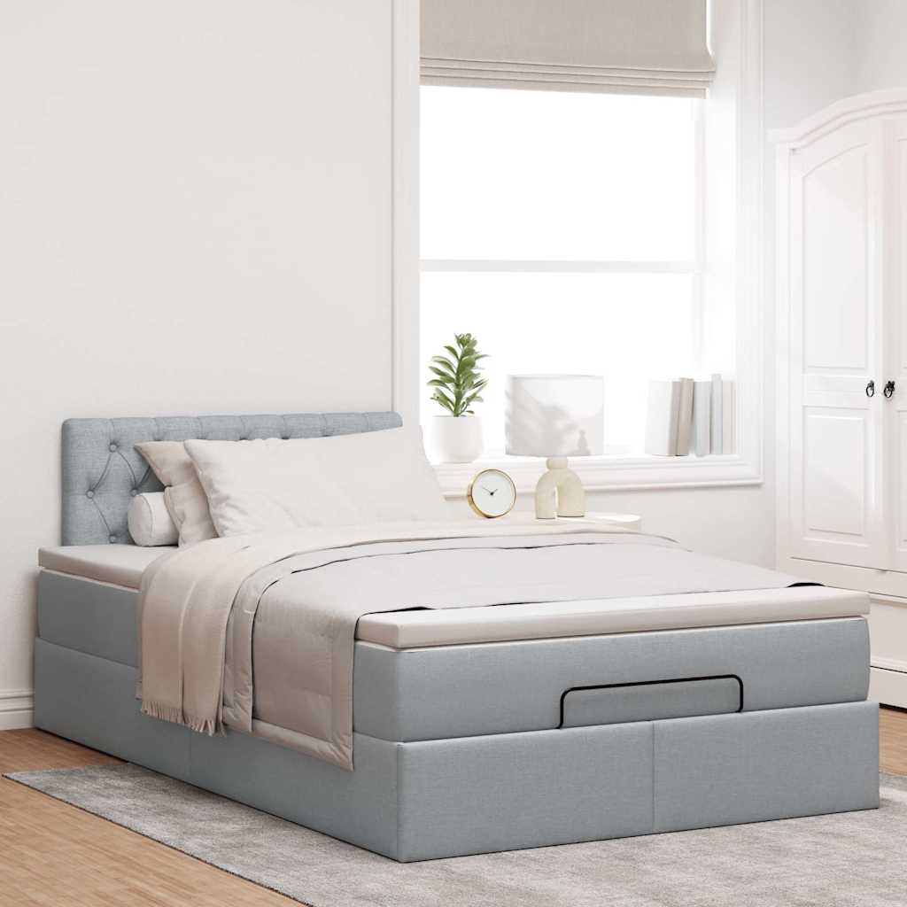 Ottoman bed met matras en LED's 120x190 cm stof lichtgrijs