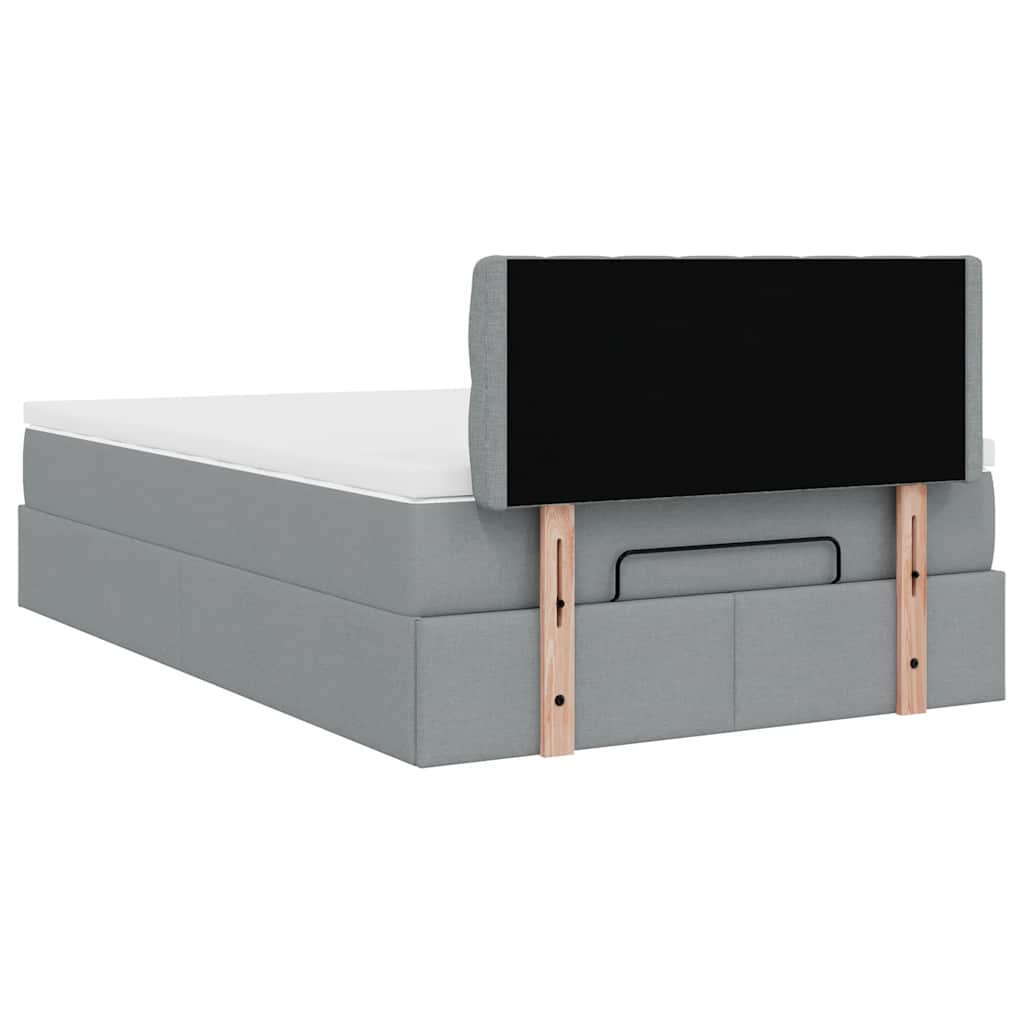 Ottoman bed met matras en LED's 120x190 cm stof lichtgrijs