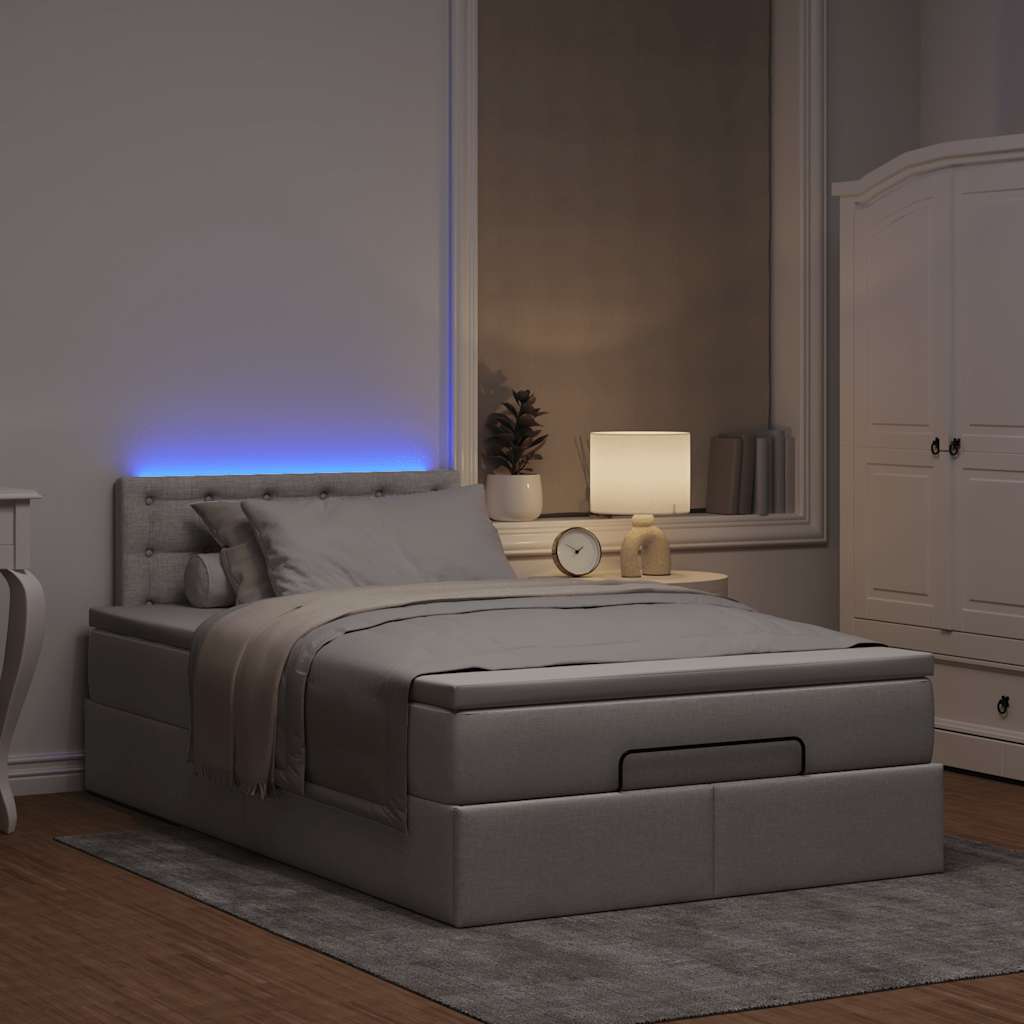 Ottoman bed met matras en LED's 120x190 cm stof taupe