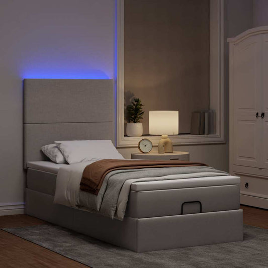 Ottoman bed met matras en LED's 90x190cm stof taupe