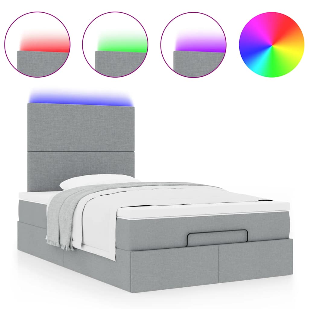 Ottoman bed met matras en LED's 120x190 cm stof lichtgrijs