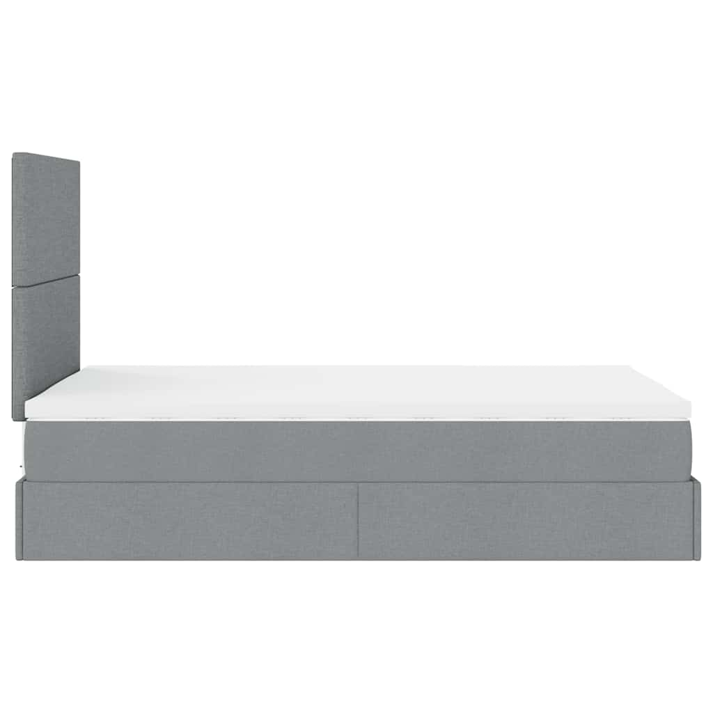 Ottoman bed met matras en LED's 120x190 cm stof lichtgrijs