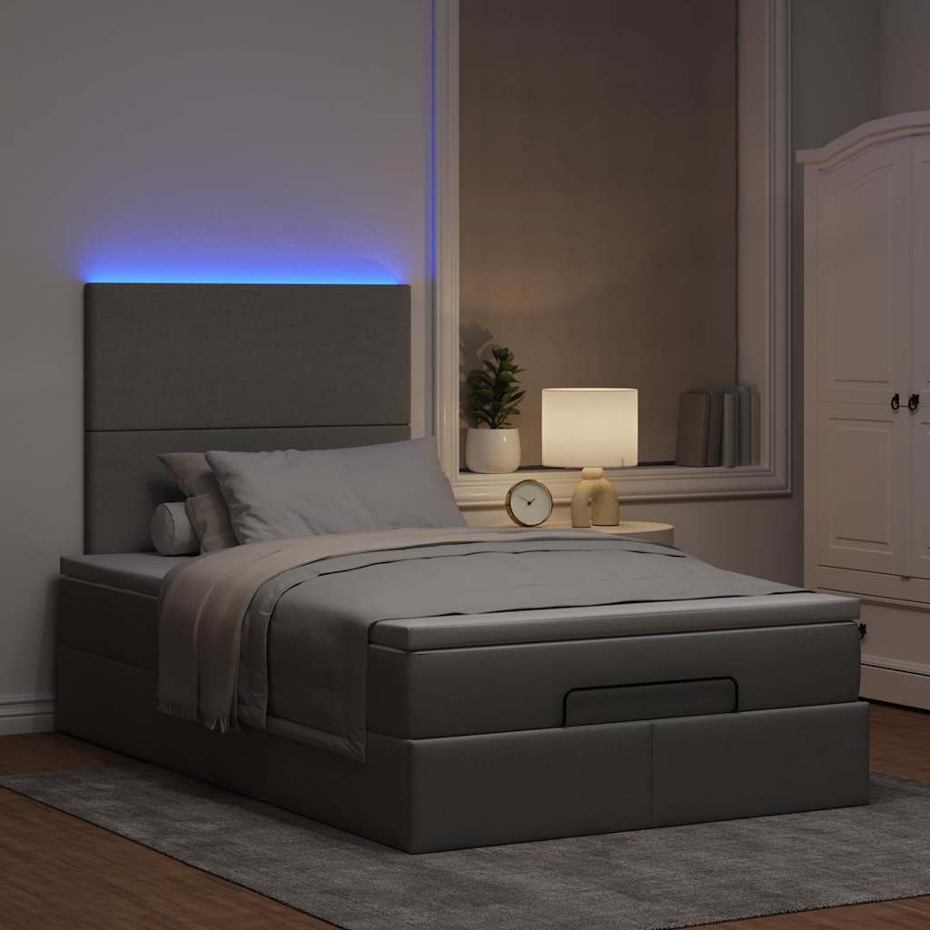 Ottoman bed met matras en LED's 120x190 cm stof lichtgrijs