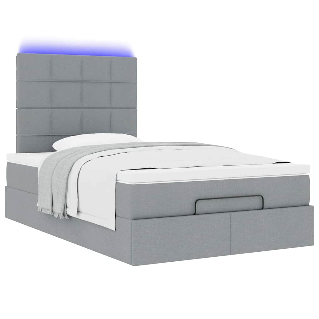 Ottoman bed met matras en LED's 120x190 cm stof lichtgrijs