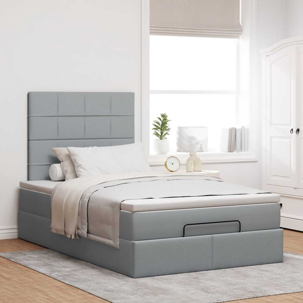 Ottoman bed met matras en LED's 120x190 cm stof lichtgrijs