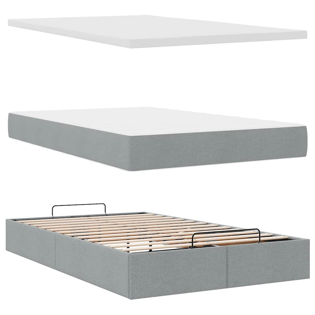 Ottoman bed met matras en LED's 120x190 cm stof lichtgrijs