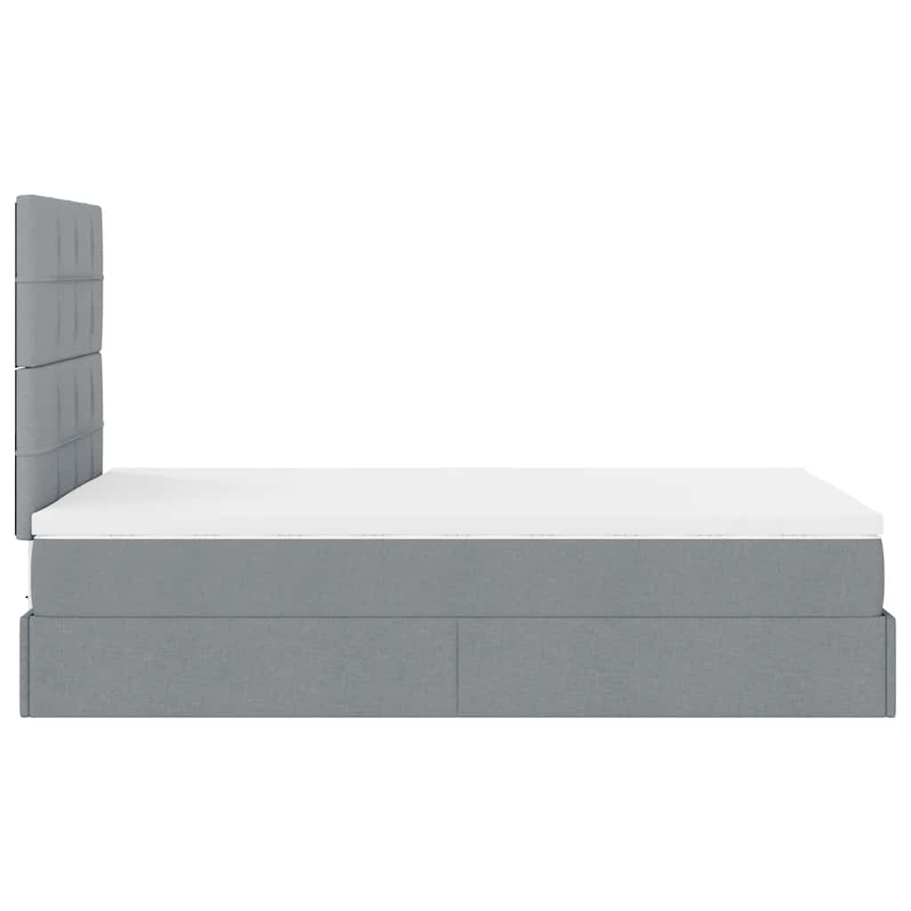 Ottoman bed met matras en LED's 120x190 cm stof lichtgrijs