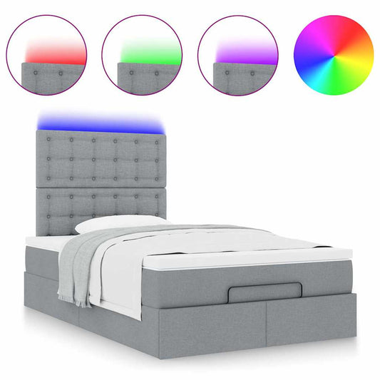 Ottoman bed met matras en LED's 120x190 cm stof lichtgrijs