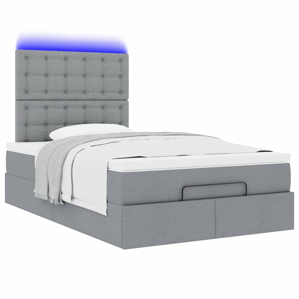 Ottoman bed met matras en LED's 120x190 cm stof lichtgrijs